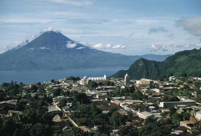 The city of Solola and Lake Atitlán in the foreground and the volcano San Pedro in the background. 